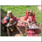 42 family weaving cloth in traditional quechua dress.jpg